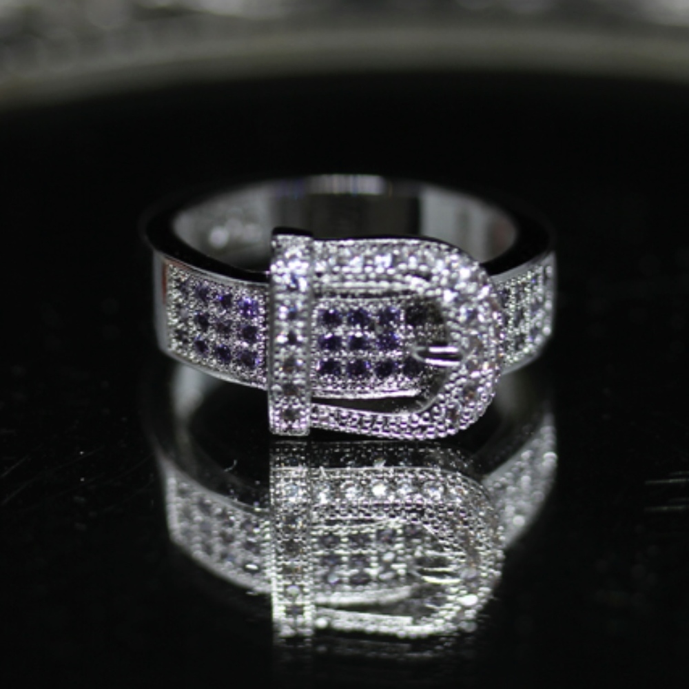 Silver and Purple Buckle Ring size 7 sterling silver. Silver and purple stones